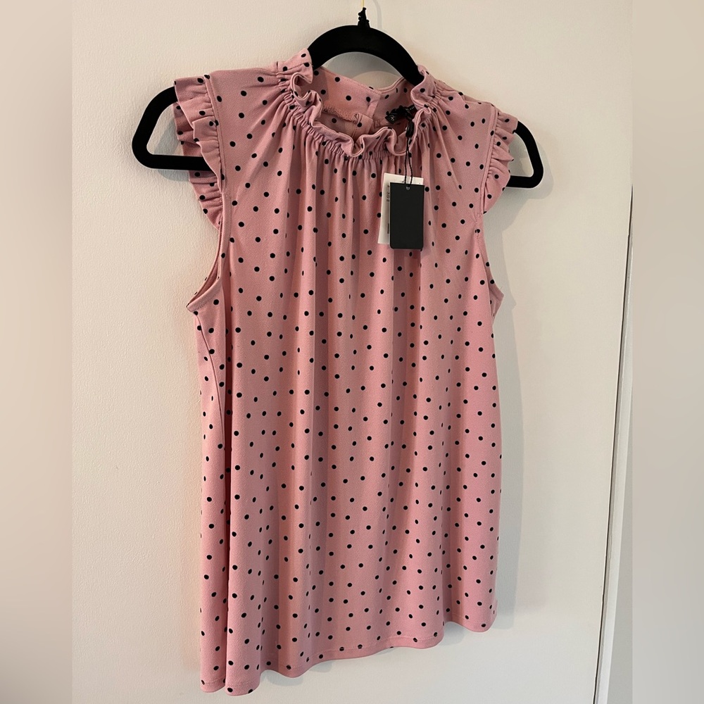 NWT. Pink (light pink) blouse with black polka dots. Size medium.